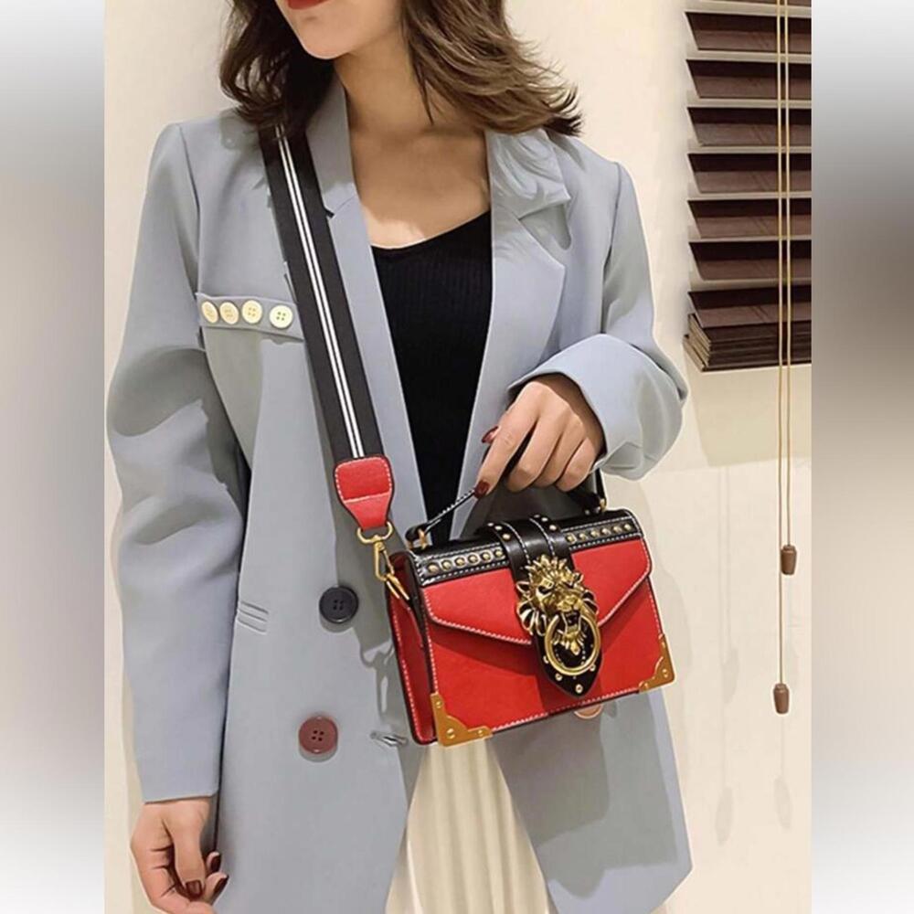 Stylish Red and Black Handbag with Gold Accents - Picture 1 of 6
